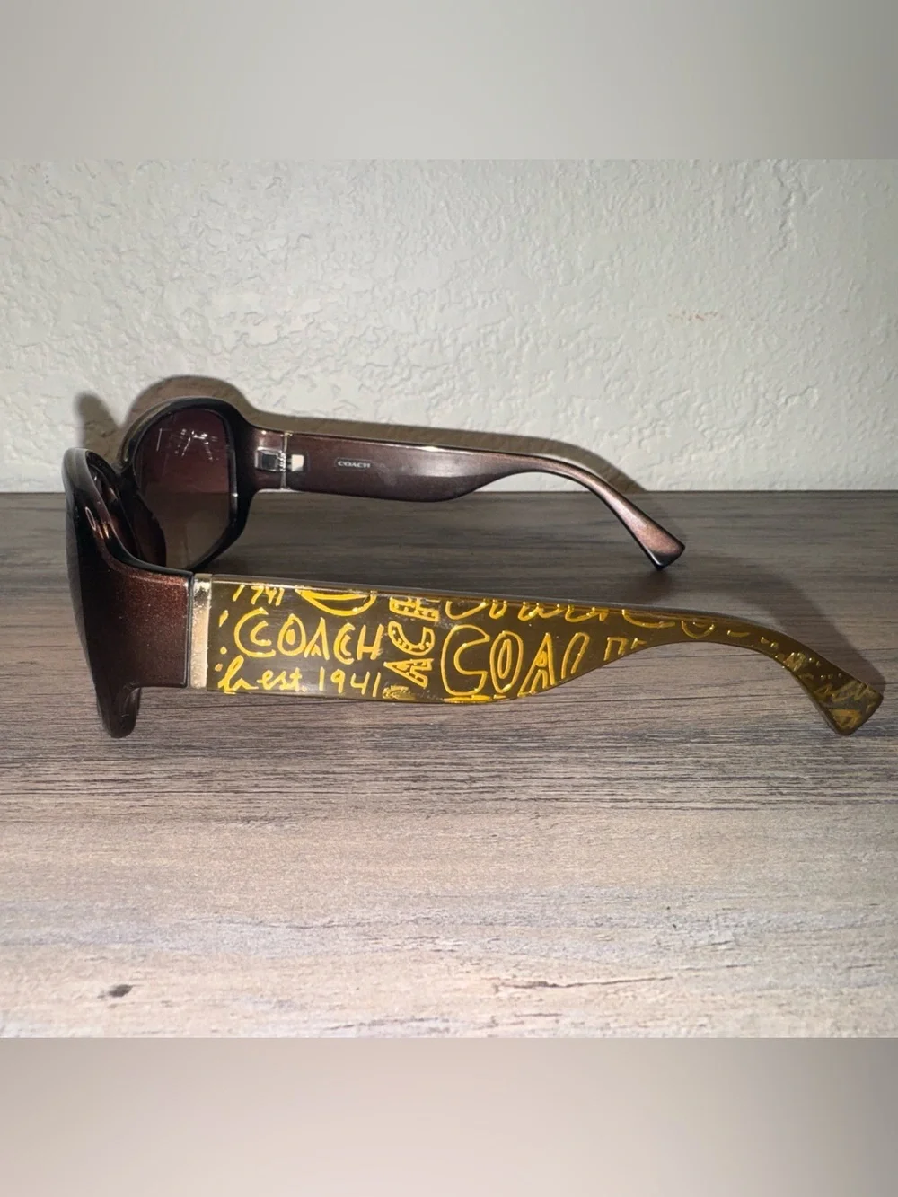 Coach Women’s Brown Sunglasses with Yellow Logo Accent